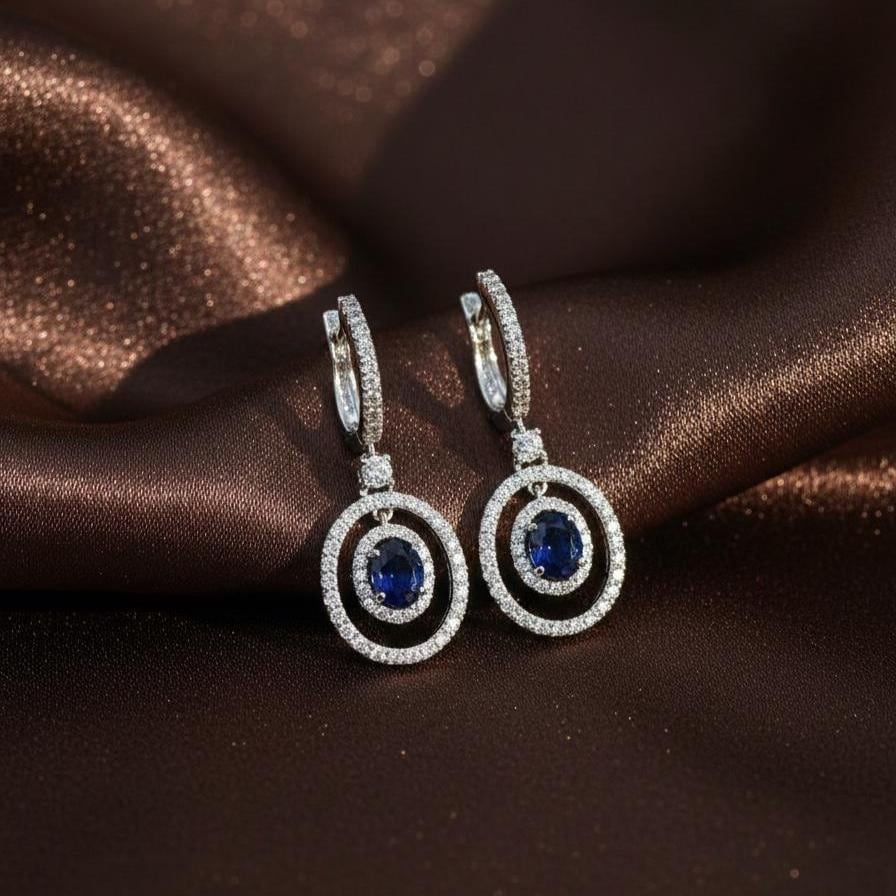 Blue sapphire earrings with diamond accents